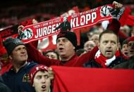 LIVERPOOL, ENGLAND - DECEMBER 11:  Liverpool fans sing during the Premier League match between Liverpool and West Ham United at Anfield on December 11, 2016 in Liverpool, England.  (Photo by Jan Kruger/Getty Images)
